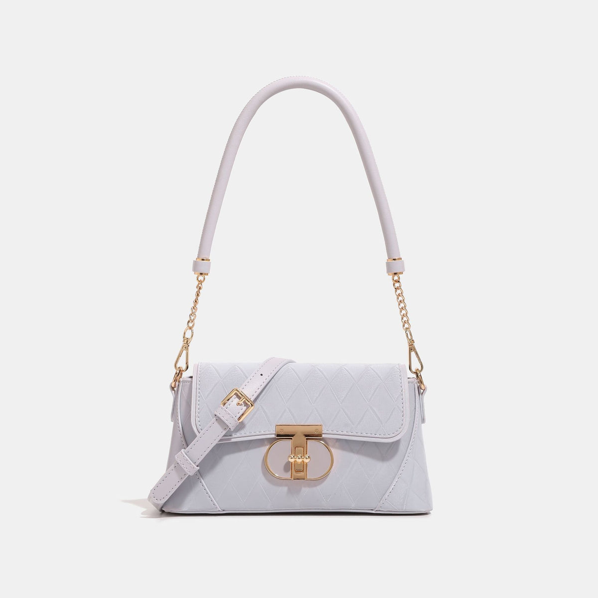 Quilted diamond-pattern flap bag with circular gold-tone turn-lock closure, chain shoulder strap, and tubular top handle