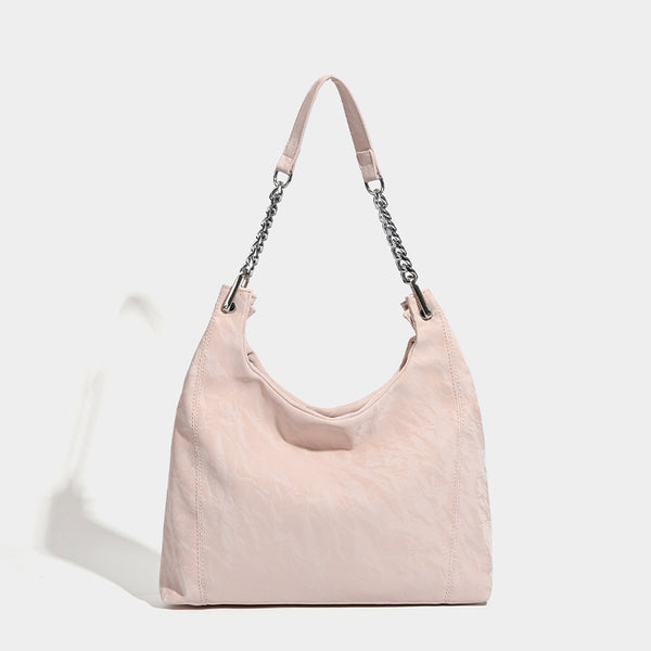 Large embossed leather-look shoulder tote bag with silver-tone chain strap, detail view 6