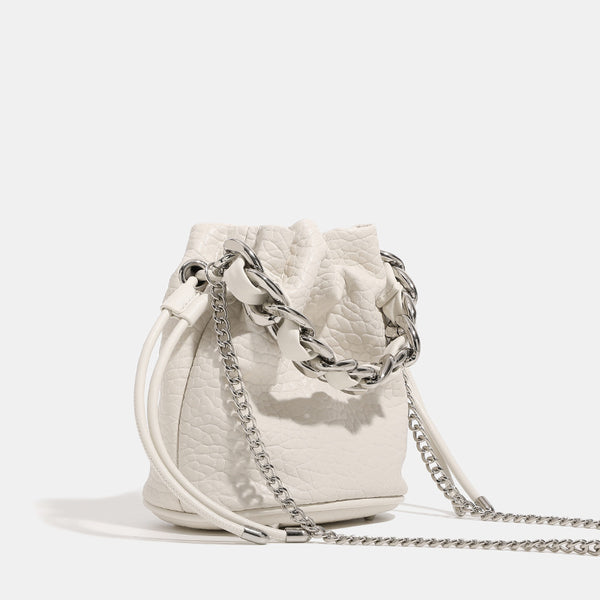 Mini pebbled leather-look bucket bag with chunky silver-tone chain handle and drawstring closure, detail view 3
