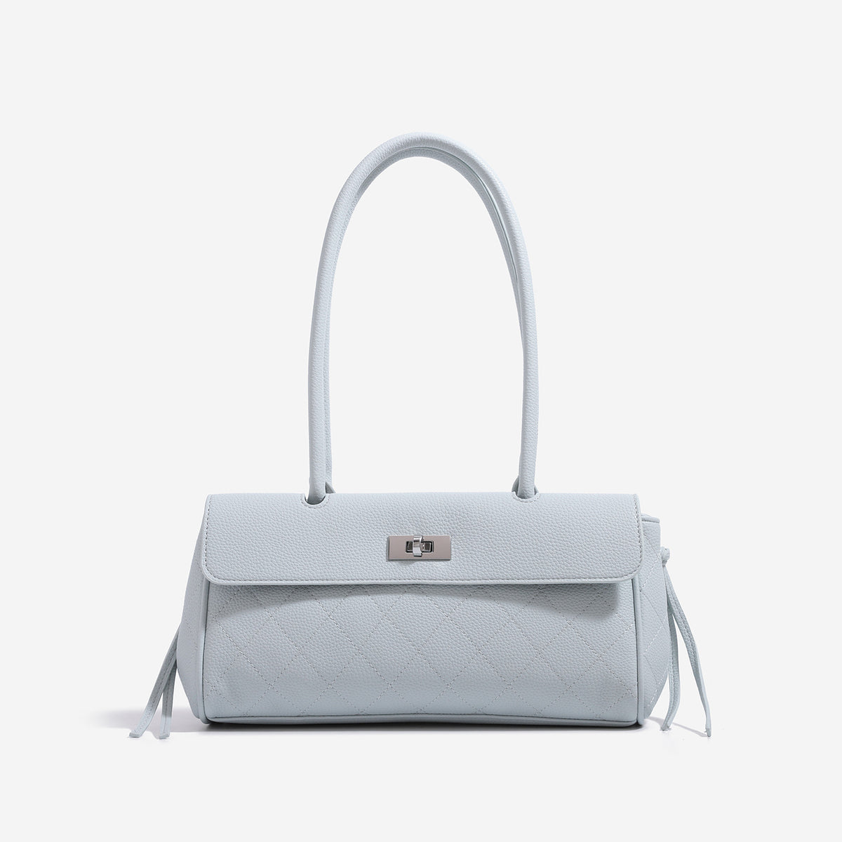 Structured black baguette bag with diamond-quilted front panel, gold-tone turn-lock flap closure, and dual looped top