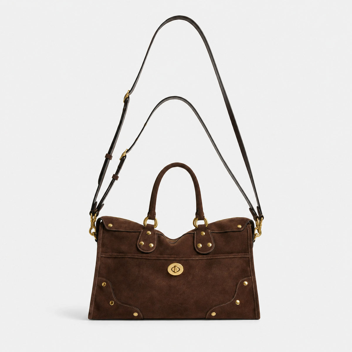Strukturierte Henkeltasche mit mattem Veloursleder-Finish in Dunkelbraun, goldfarbenen Nieten, Drehverschluss und zwei abgerundeten Tragegriffen