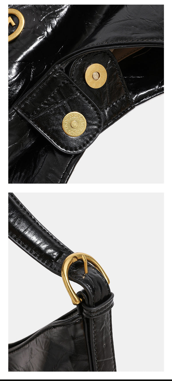 Glossy crinkled hobo shoulder bag with gold-tone logo hardware and adjustable strap, detail view 10