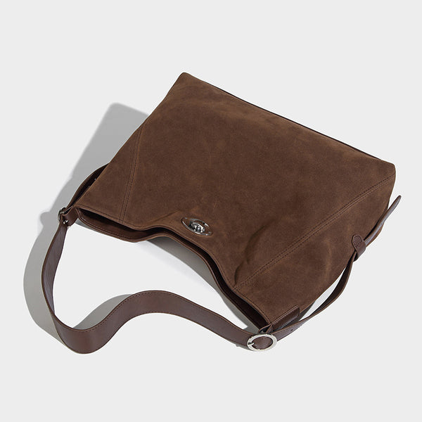 Slouchy hobo shoulder bag with turn-lock flap closure and adjustable strap, detail view 24