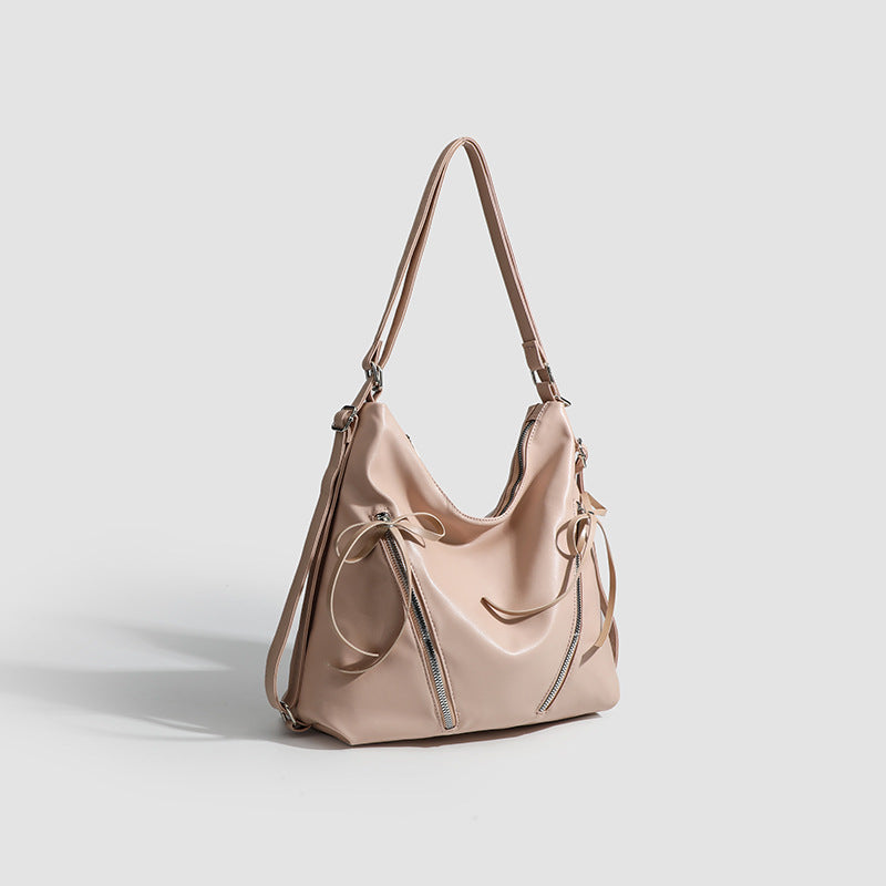 Slouchy hobo shoulder bag with bow detail and silver-tone hardware, detail view 3
