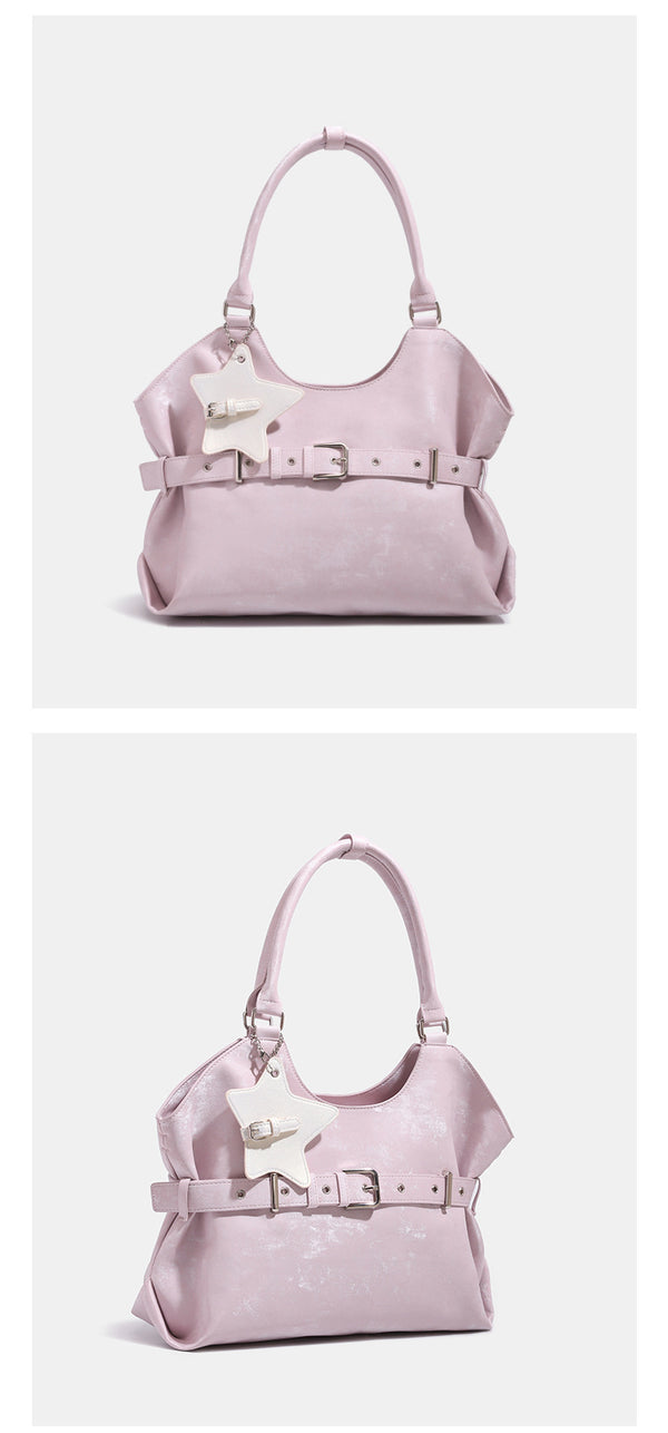 Large soft hobo shoulder bag with glossy textured finish, decorative belt buckle, star charm, and silver-tone hardware