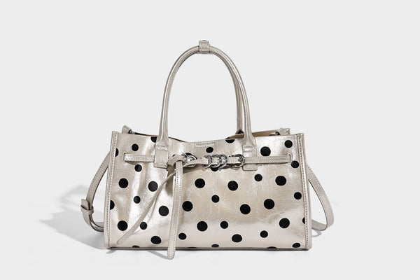 Structured glossy leather-look polka-dot satchel tote with dual top handles and detachable shoulder strap, detail view 8