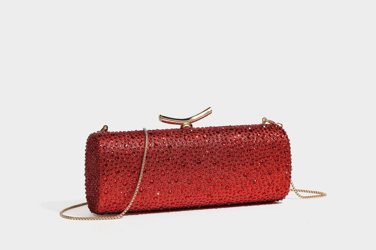 Structured rectangular hard-case clutch bag covered in all-over rhinestone crystal embellishment with curved kiss-lock top