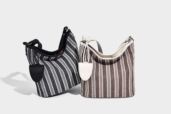 Large striped canvas hobo shoulder bag with cream trim and silver-tone hardware, detail view 27