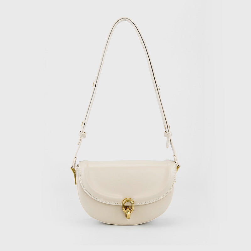 Mini black leather-look saddle bag with gold-tone carabiner clasp and adjustable shoulder strap, detail view 2