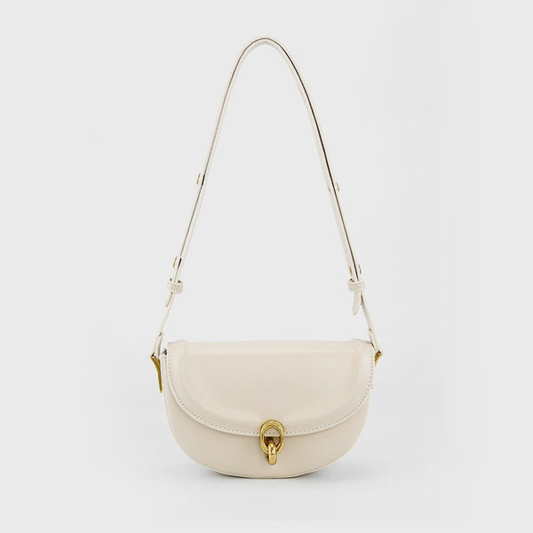 Mini black leather-look saddle bag with gold-tone carabiner clasp and adjustable shoulder strap, detail view 2