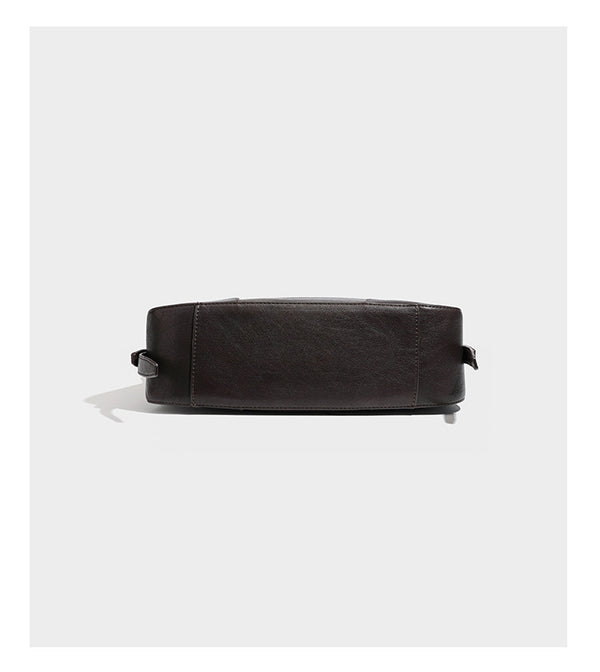 Dark brown curved zip-top hobo shoulder bag with slim adjustable strap and silver-tone hardware, detail view 15