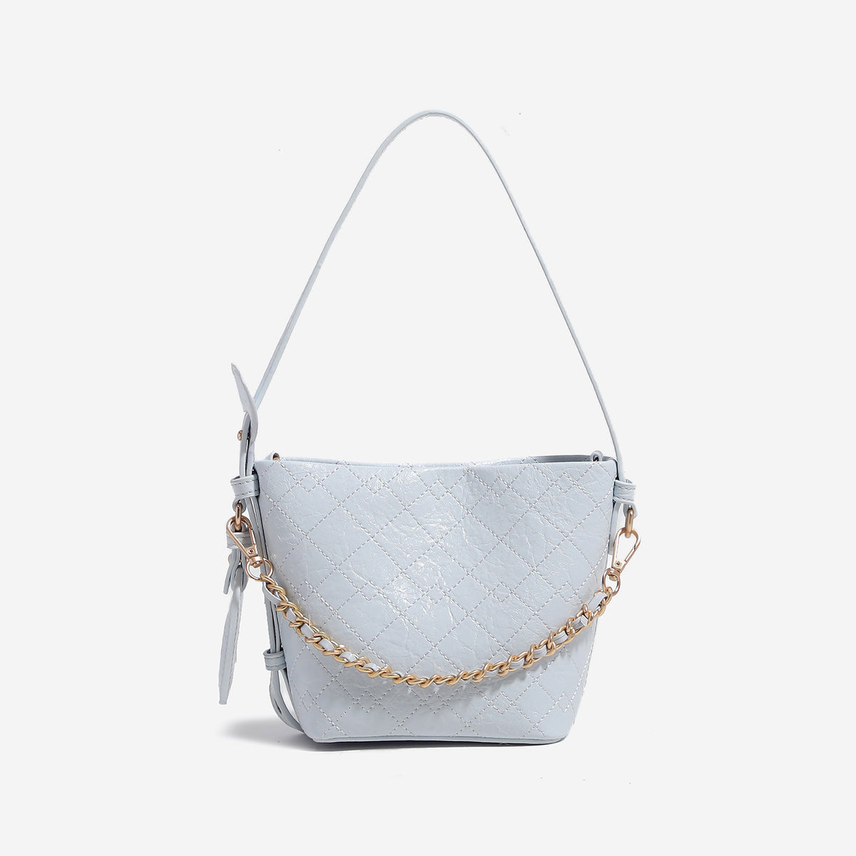 Small diamond-quilted bucket bag with gold-tone chain accent, heart strap detail, hanging tag, and matching zip coin pouch