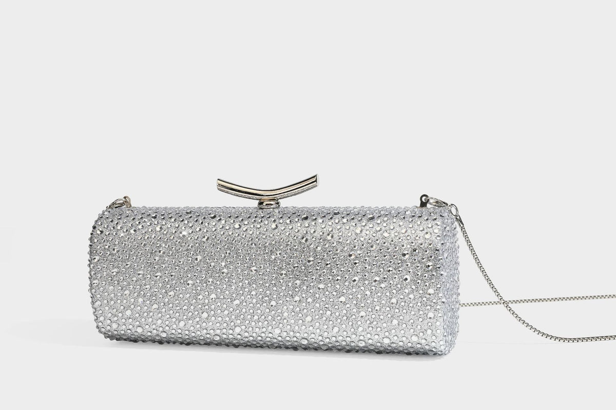 Structured rectangular hard-case clutch bag covered in all-over rhinestone crystal embellishment with curved kiss-lock top