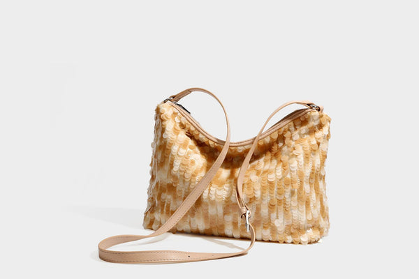 Slouchy paillette sequin hobo shoulder bag with zip closure and adjustable leather-look strap with silver chain hardware