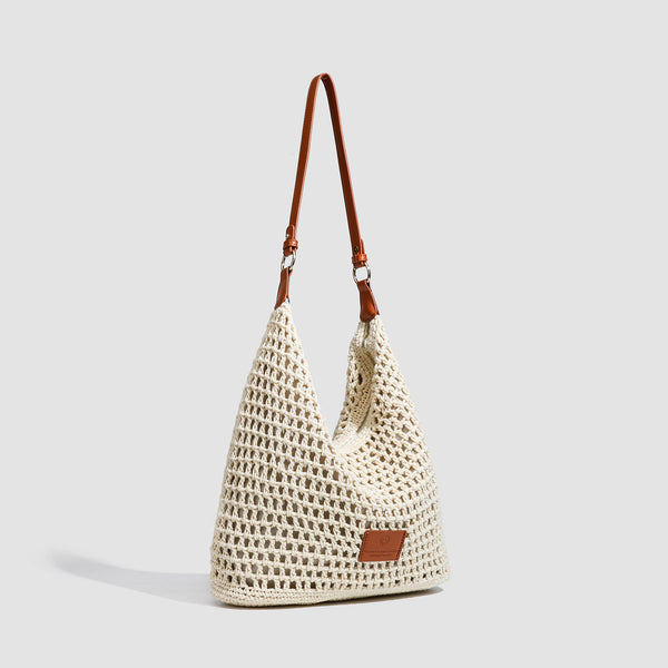 Cream open-weave crochet hobo shoulder bag with tan leather-look strap and gold-tone ring hardware, detail view 2