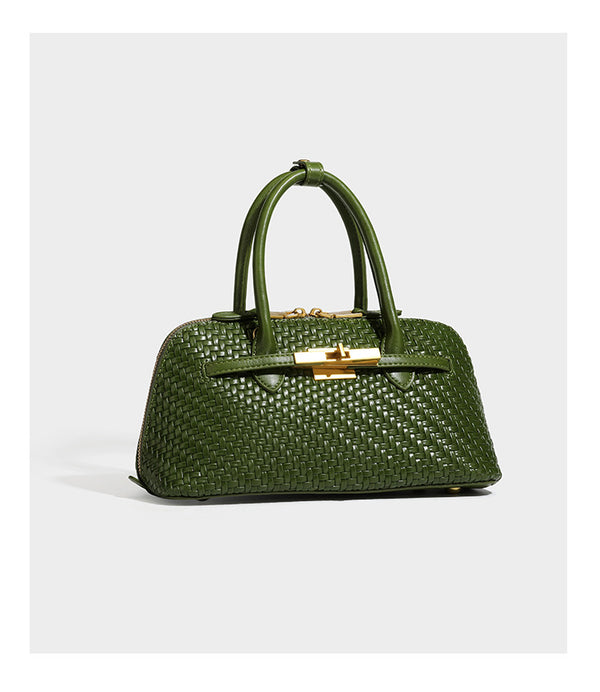 Structured woven-embossed leather-look satchel with dual rolled top handles, gold-tone turn-lock closure, and detachable