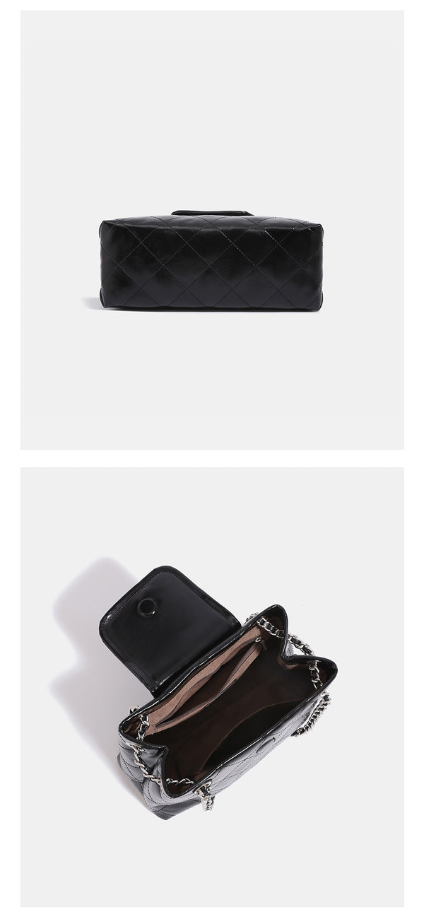 Quilted trapezoid shoulder bag with chain straps, flap closure, and ring hardware, detail view 14