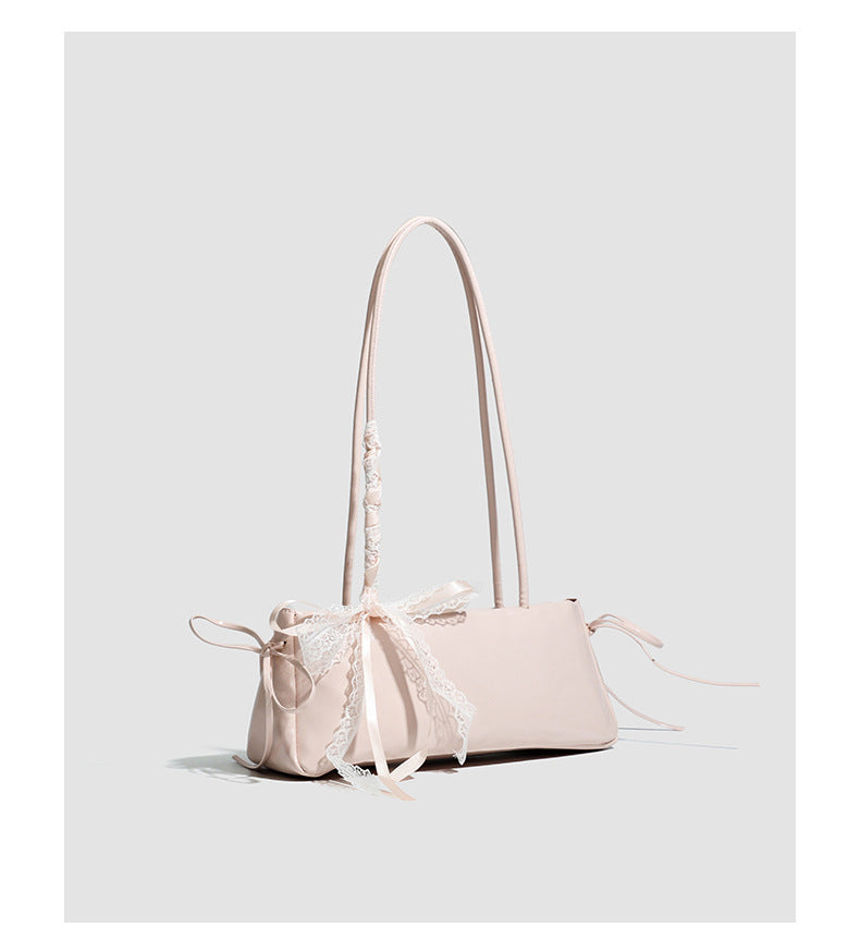 Compact glossy leather-look shoulder bag with lace bow and ribbon trim, detail view 16