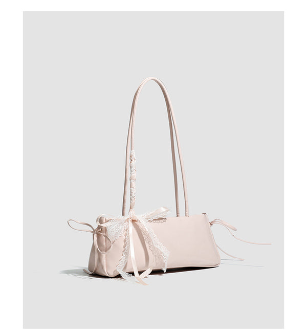 Compact glossy leather-look shoulder bag with lace bow and ribbon trim, detail view 16