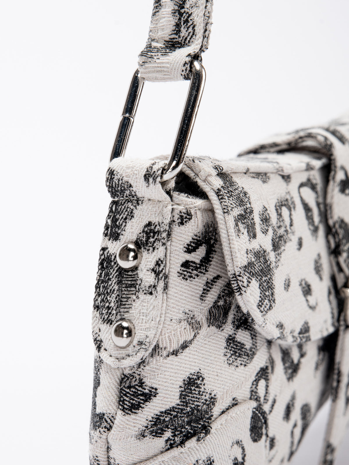 Small washed leopard print shoulder bag in blue-grey with silver buckle strap and stud accents, detail view 15