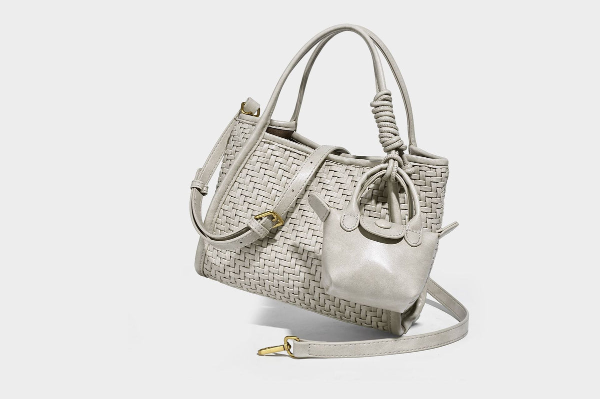 Woven texture open-top tote bag with smooth trim top handles and attached mini drawstring pouch in dark brown, detail view 28