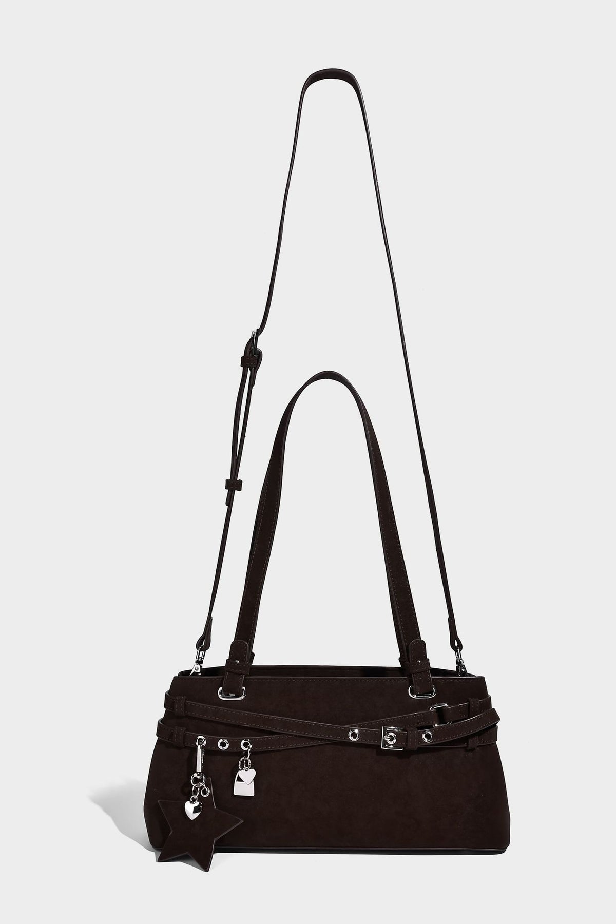 Structured trapezoid shoulder tote in dark brown matte suede-look finish with dual straps, wraparound belt bands