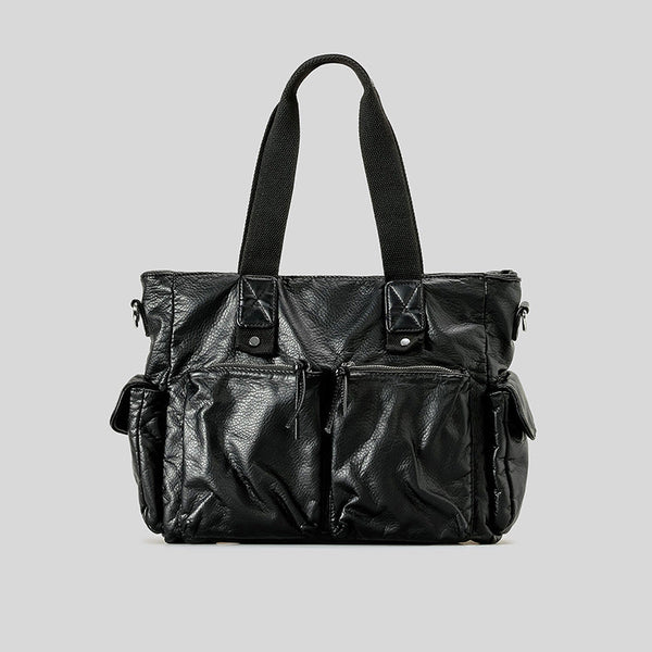 Slouchy crinkled pebbled leather-look convertible tote bag in gunmetal black with woven top handles, adjustable shoulder