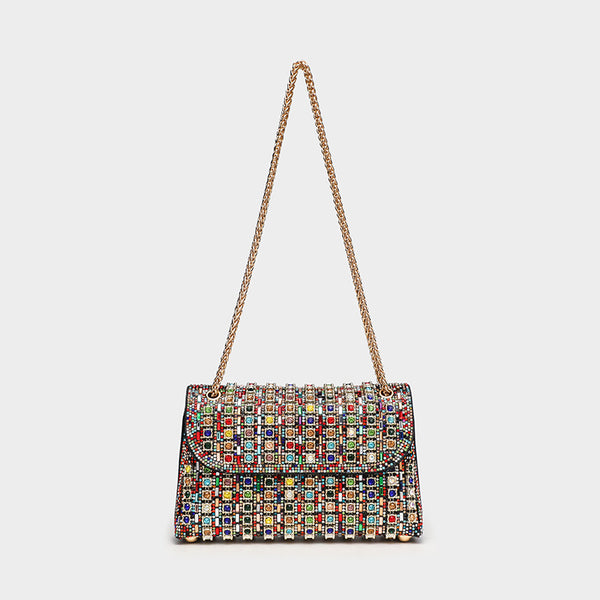 Structured mini flap crossbody bag covered in grid-set rhinestones with silver-tone chain strap, detail view 3