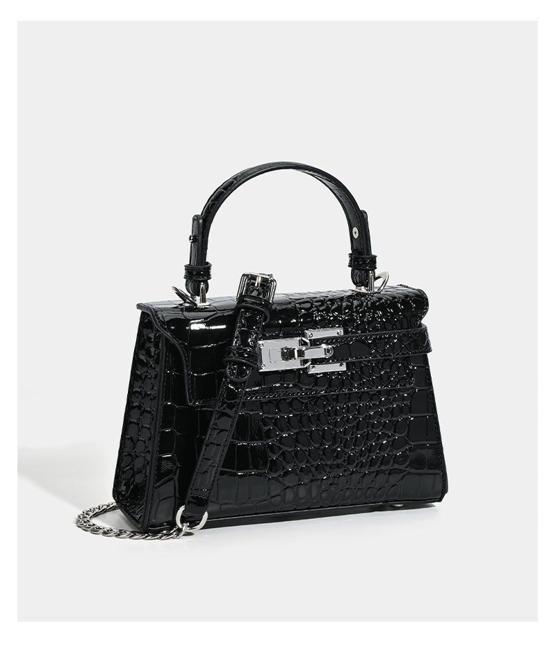 Croc-embossed mini top-handle satchel with silver turn-lock closure and adjustable crossbody strap, detail view 16
