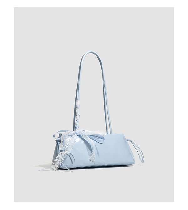 Compact glossy leather-look shoulder bag with lace bow and ribbon trim, detail view 18