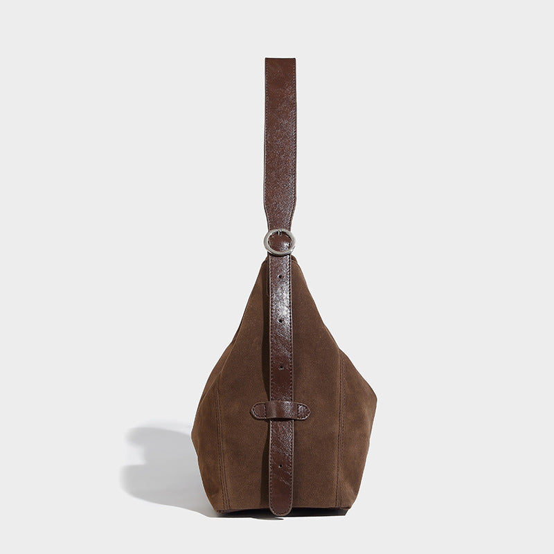 Slouchy hobo shoulder bag with turn-lock flap closure and adjustable strap, detail view 20