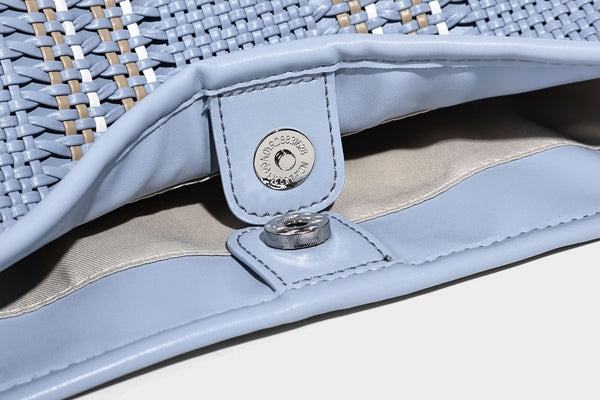 Woven bucket shoulder bag with leather-look trim, silver-tone hardware, and beaded tassel charm, detail view 34