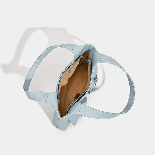 Powder blue structured tote bag with dual front flap buckle pockets and silver-tone hardware, detail view 4