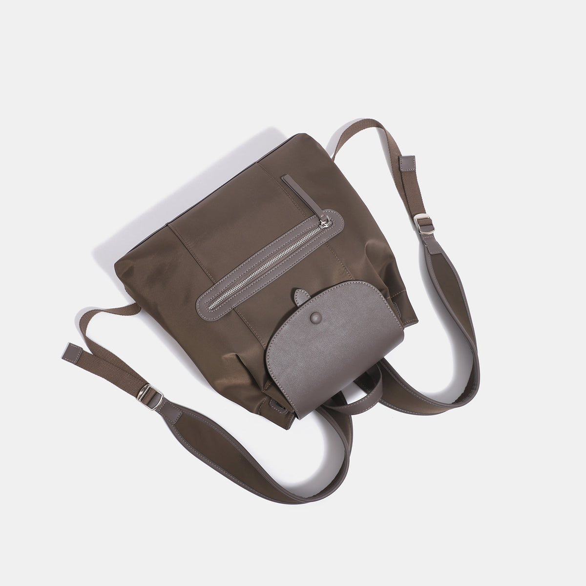 Structured flap backpack handbag with snap closure and front zip pocket, detail view 4