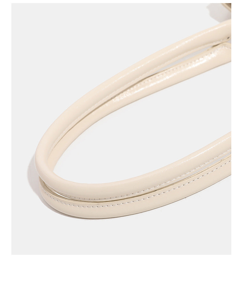 Glossy leather-look baguette shoulder bag with silver-tone hardware and buckle-strap detail, detail view 15