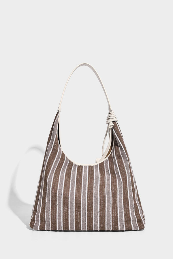 Slouchy striped canvas hobo shoulder bag with cream trim and long knotted strap, detail view 11