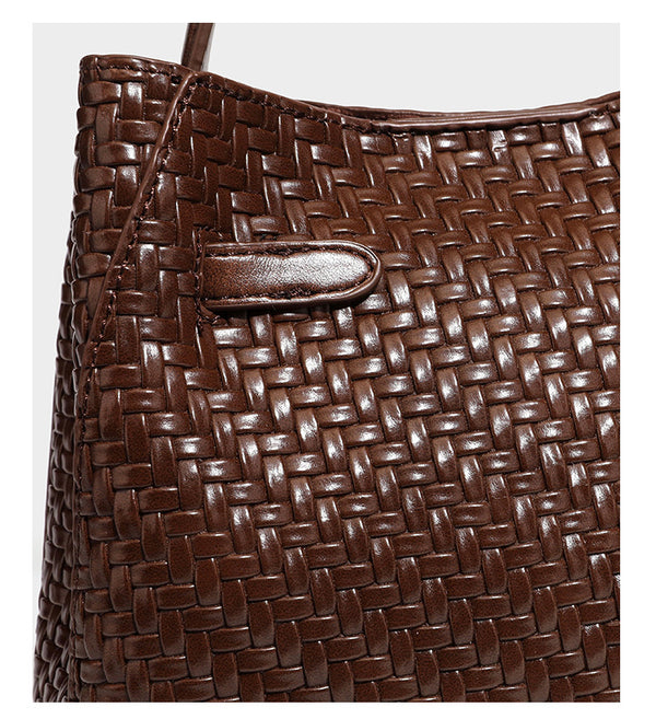 Structured woven leather-look bucket bag with gold-tone turn-lock hardware and detachable shoulder strap, detail view 26