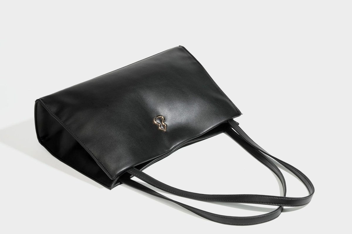 Structured rectangular shoulder tote bag with smooth leather-look finish, long double straps, and gold-tone gourd emblem on