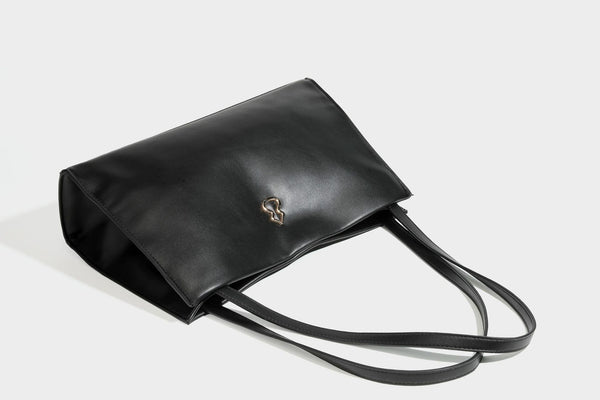 Structured rectangular shoulder tote bag with smooth leather-look finish, long double straps, and gold-tone gourd emblem on