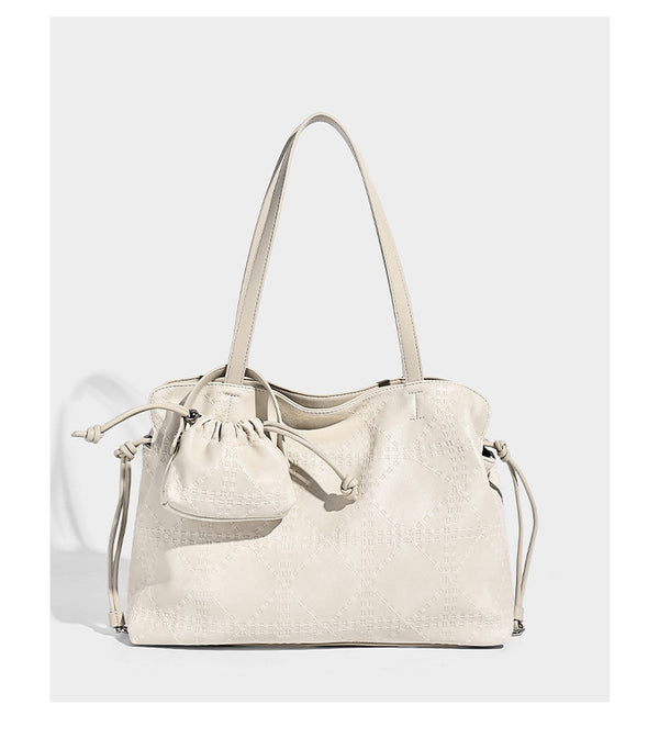 Große Tote-Schultertasche aus geprägtem Lederimitat in Elfenbein-Creme mit zwei langen Riemen, seitlicher Kordelraffung und abnehmbarem