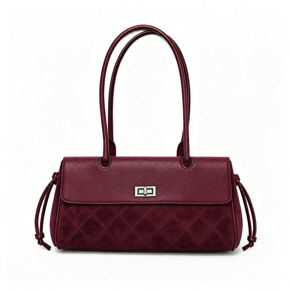 Compact two-tone quilted shoulder bag with black leather-look flap, silver turn-lock clasp, diamond-quilted body, side