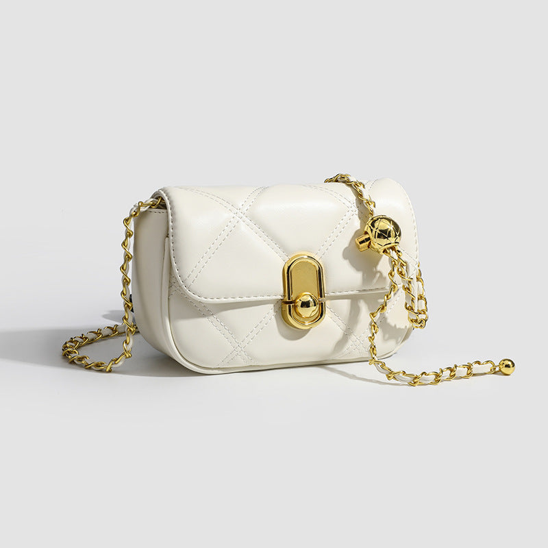 Compact diamond-quilted mini crossbody bag with gold-tone turn-lock closure and woven chain strap, detail view 3