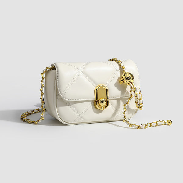 Compact diamond-quilted mini crossbody bag with gold-tone turn-lock closure and woven chain strap, detail view 3