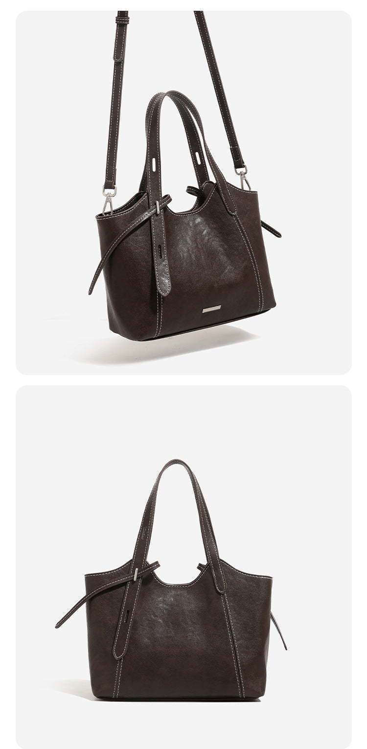 Strukturierte Tote-Bag in Used-Lederoptik mit kontrastierenden Steppnähten, seitlichem Bindebanddetail, zwei Tragegriffen oben und abnehmbarem