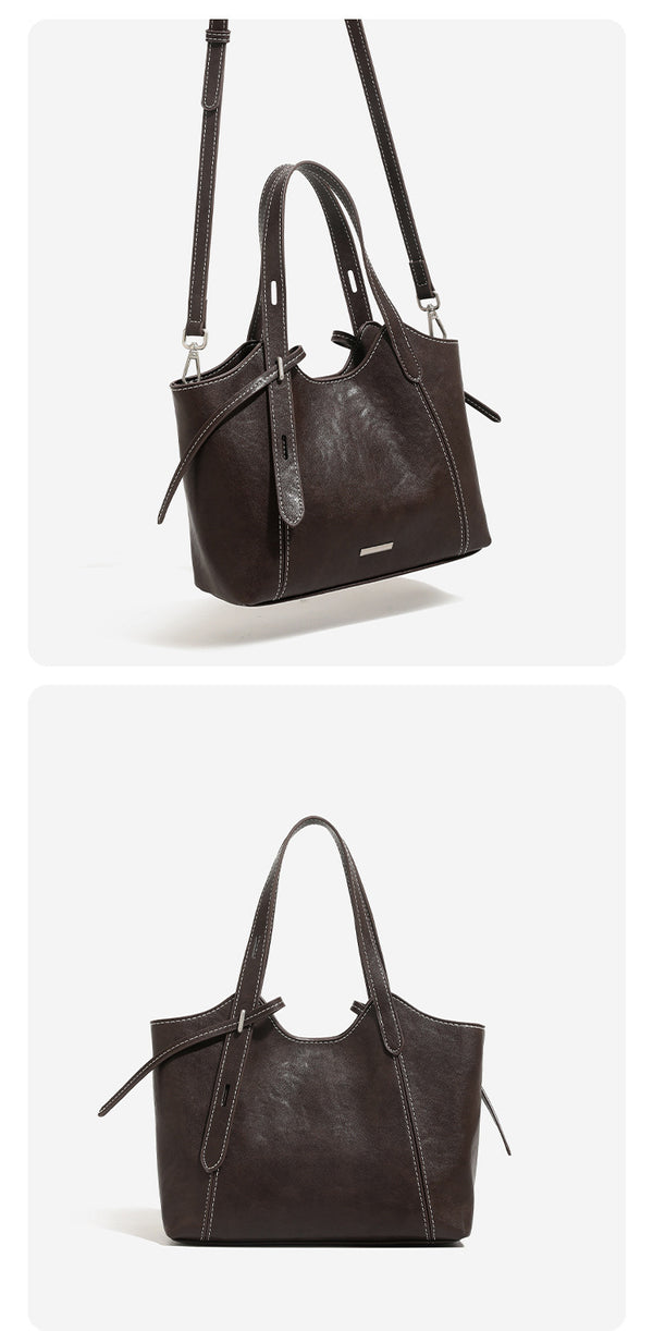 Strukturierte Tote-Bag in Used-Lederoptik mit kontrastierenden Steppnähten, seitlichem Bindebanddetail, zwei Tragegriffen oben und abnehmbarem