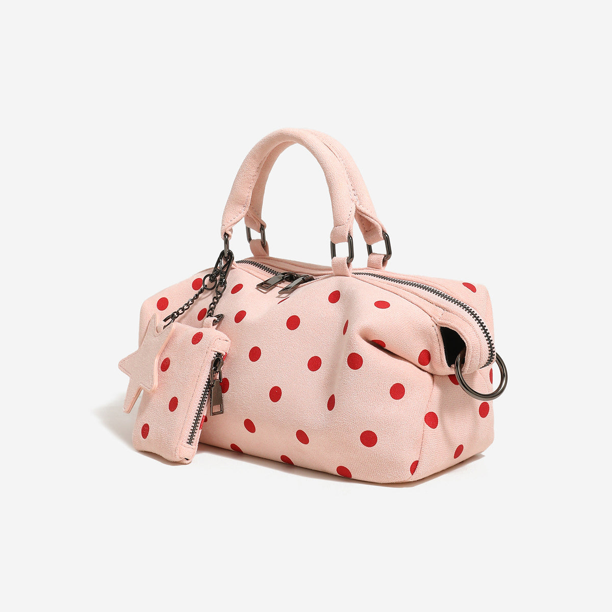 Puderrosa Boston-Tasche mit roten Punkten, Reißverschluss in Gunmetal-Optik, zwei Tragegriffen, abnehmbarem Sternanhänger und Mini-Täschchen