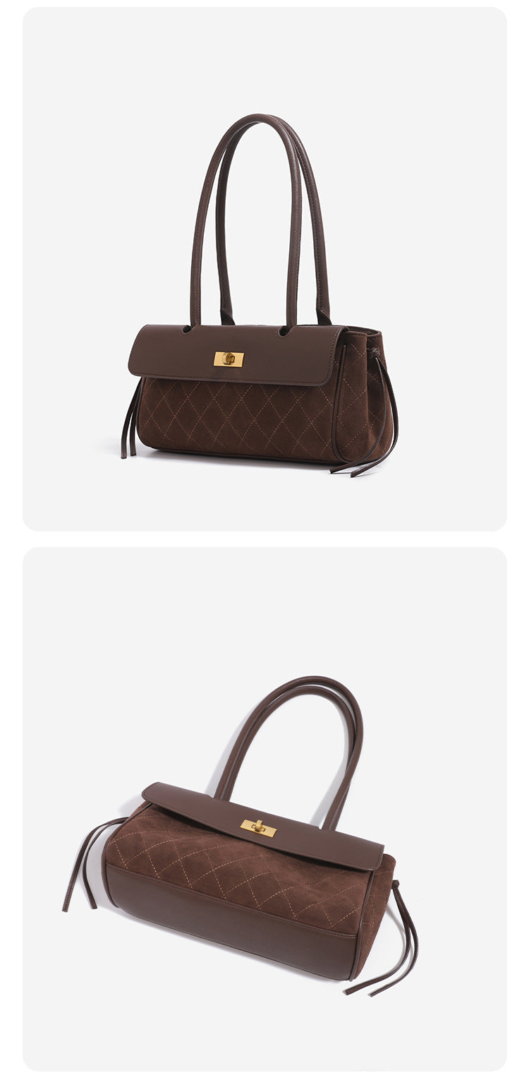 Structured diamond-quilted baguette shoulder bag with gold-tone turn-lock closure and side drawstring ties, detail view 14