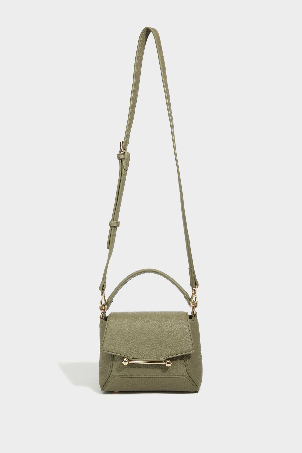 Small structured pebbled flap mini satchel with gold-tone bar hardware, short top handle, and detachable crossbody strap