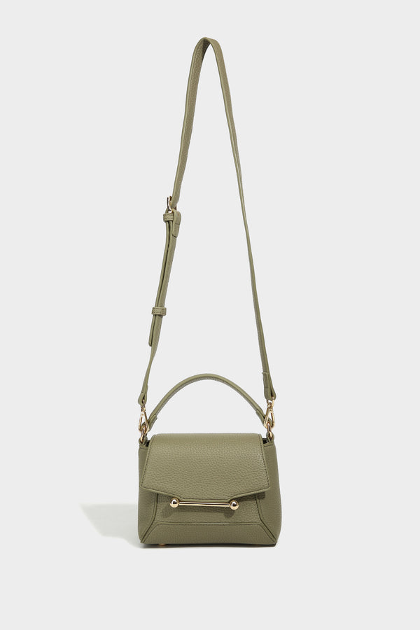 Small structured pebbled flap mini satchel with gold-tone bar hardware, short top handle, and detachable crossbody strap