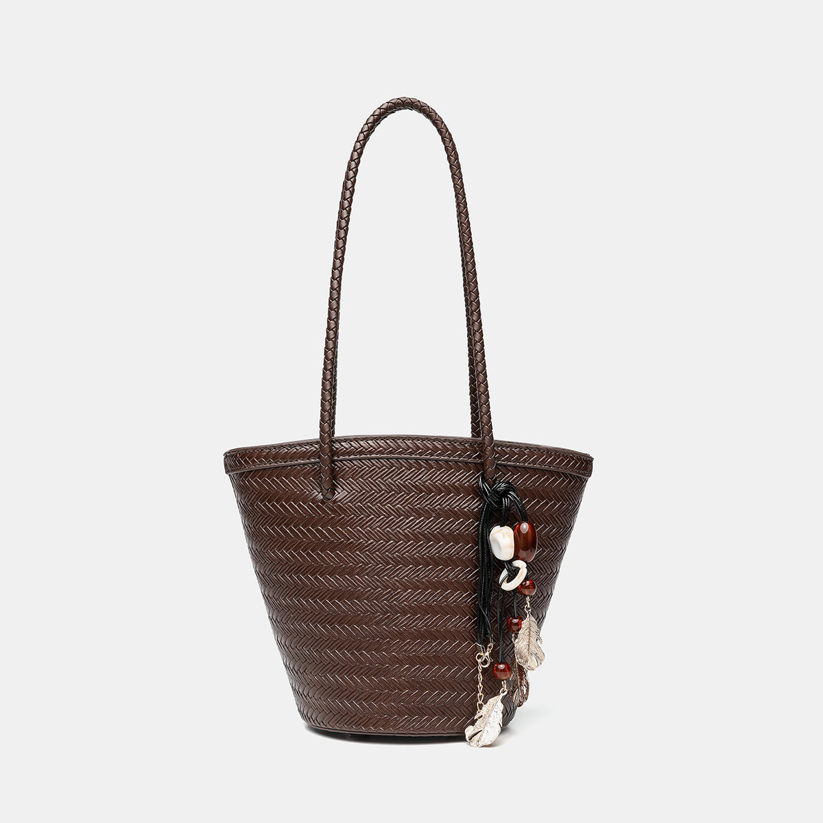 Woven herringbone-texture bucket bag with braided rope shoulder strap in dark brown, front view
